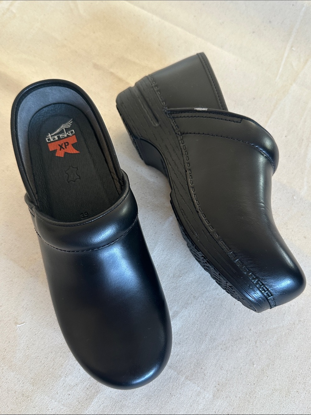 Dansko XP Black Leather Clogs